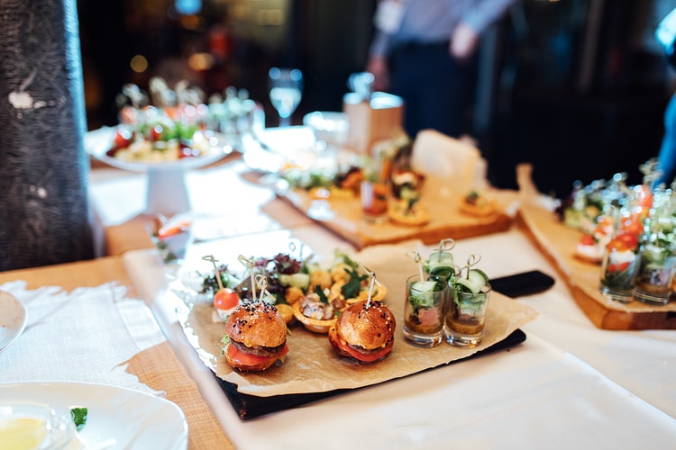 small slider sandwiches on a plate at an upscale restaurant