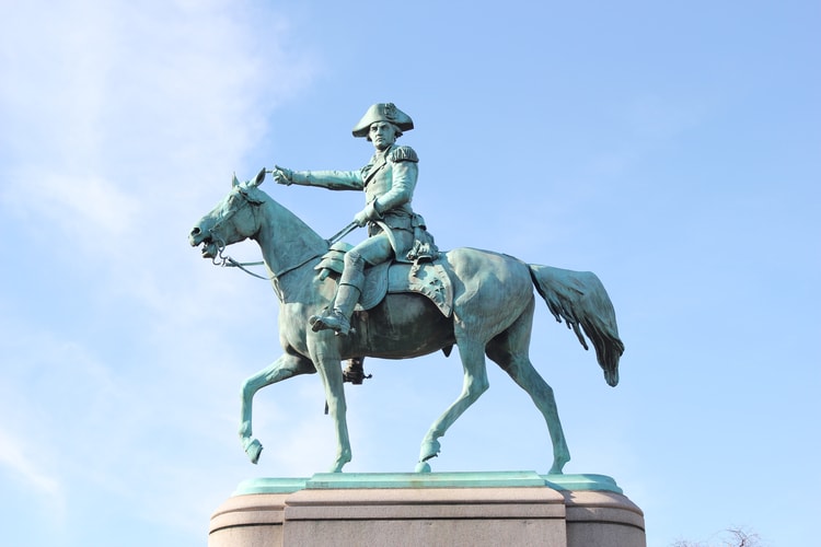 a statue of an american rider on a horse