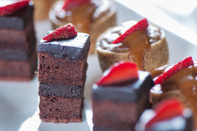 Chocolate cake bites with strawberries on top