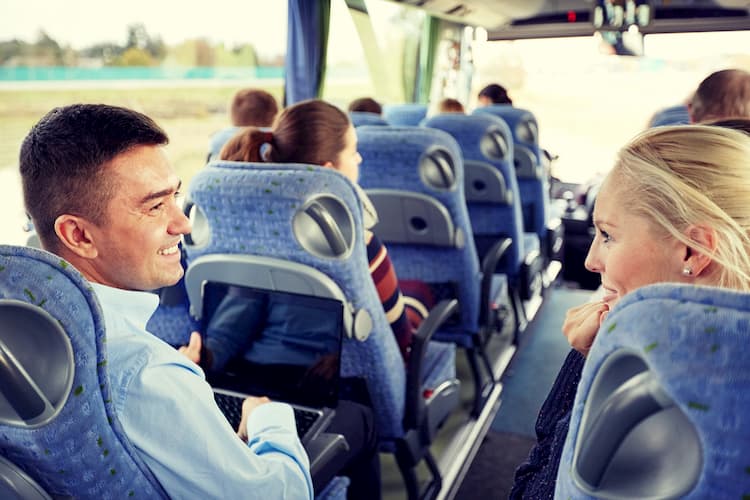 Corporate employees on a shuttle bus to and from work.