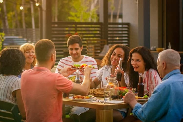 Large family eating outside